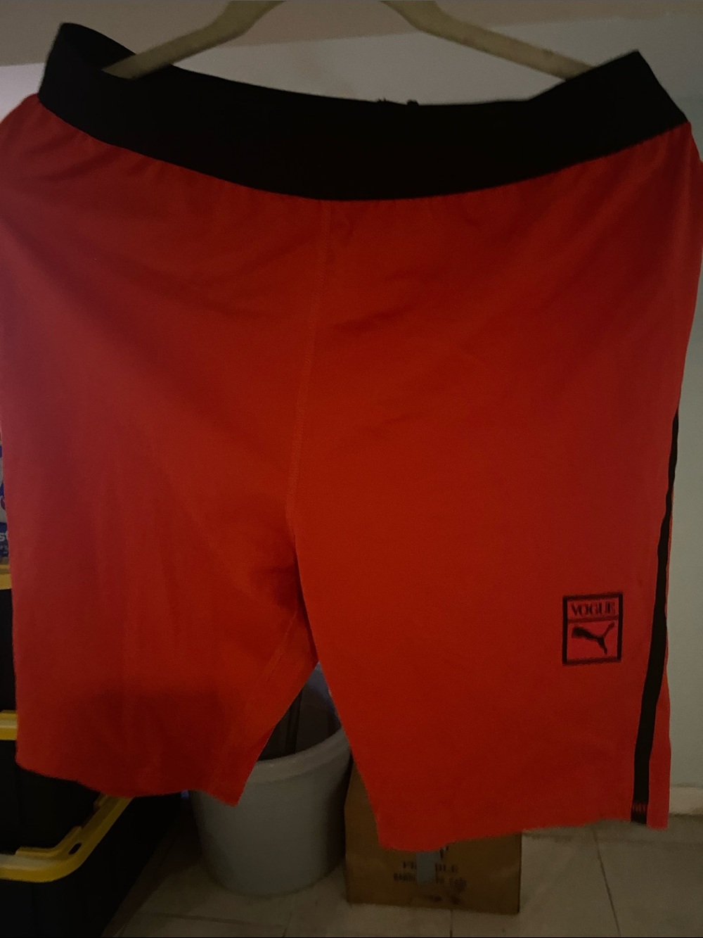 Puma Women's Red Athletic Shorts with Black Waistband and Side Stripe